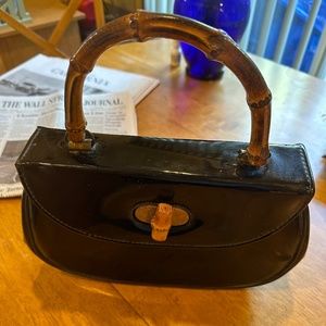 Patent leather vintage handbag..with real bamboo like wooden handle.
